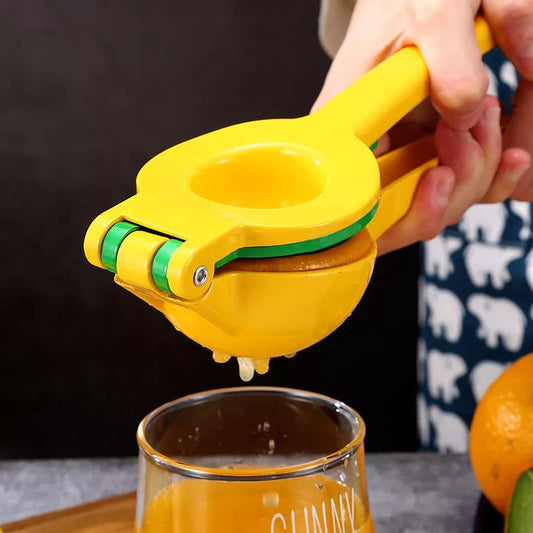 Stainless steel manual juicer for lemons and limes with seed-free design