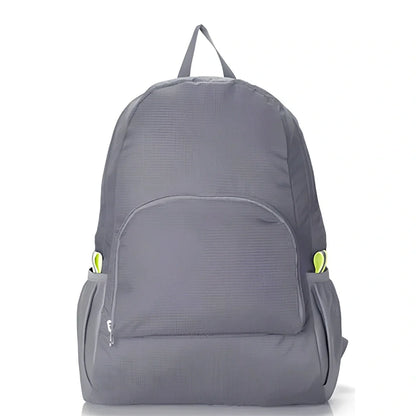Yellow foldable sports backpack showing 30.5x42cm dimensions and compression feature