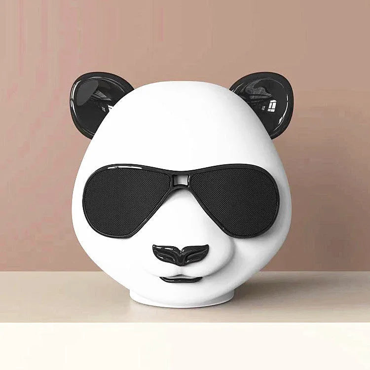 Portable mini Bluetooth speaker with classic style design, showing USB port and approximate 8cm diameter size