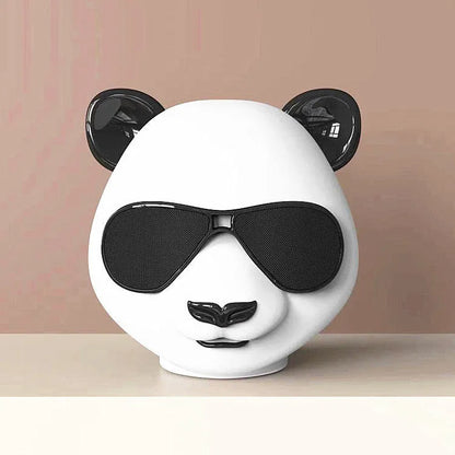 Portable mini Bluetooth speaker with classic style design, showing USB port and approximate 8cm diameter size