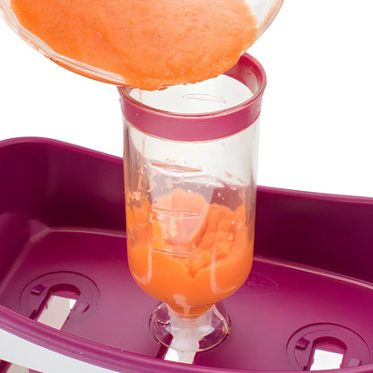 Baby food squeeze station pressing puree into 4-ounce pouch with ABS construction measuring 18x9x22cm