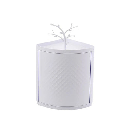 Rotatable bathroom storage organizer with a sleek, white plastic design and a covered front panel to protect against dust.