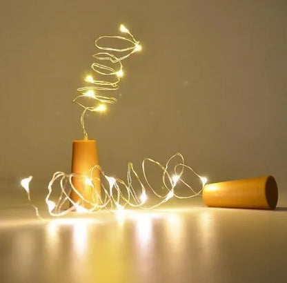 Copper wire LED string light with 20 bulbs wrapped around wine bottle for decorative lighting