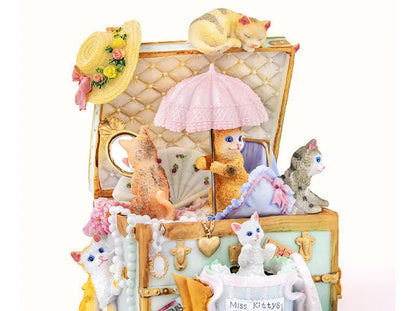 Cold porcelain cat-shaped music box with jewellery storage, rotating snowflake light, and mechanical movement