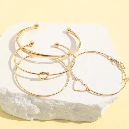 Vintage gold crystal heart letter love bangle bracelet set for women featuring four unique styles
