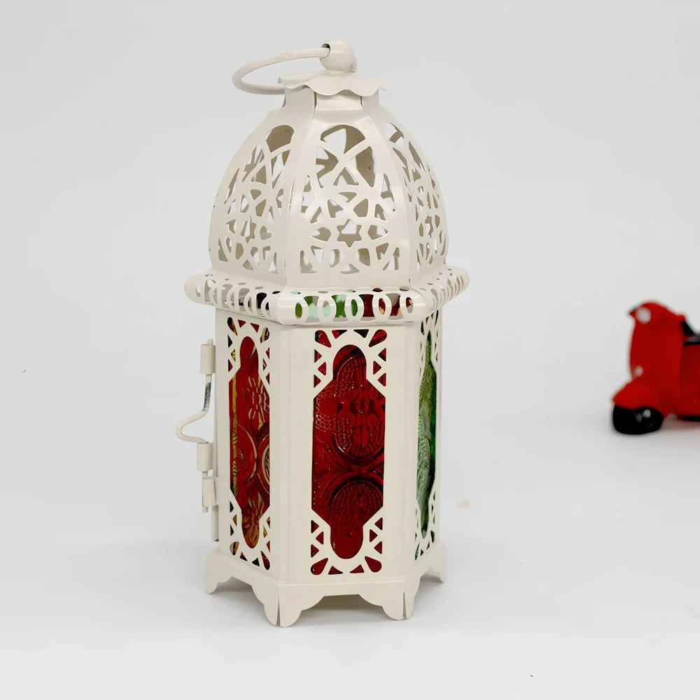 Wrought iron candle holder with 16cm height and 7cm diameter in black finish showing hanging design