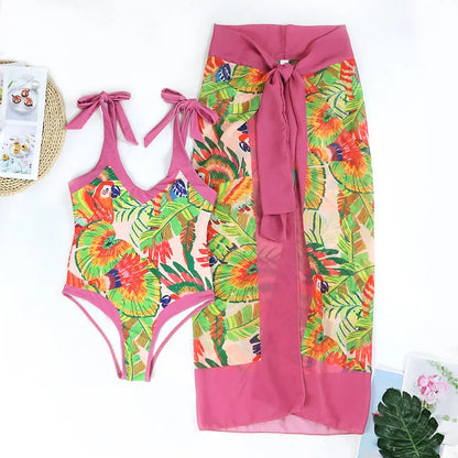Pink floral print women's retro swimsuit with V-neck and attached thin skirt cover