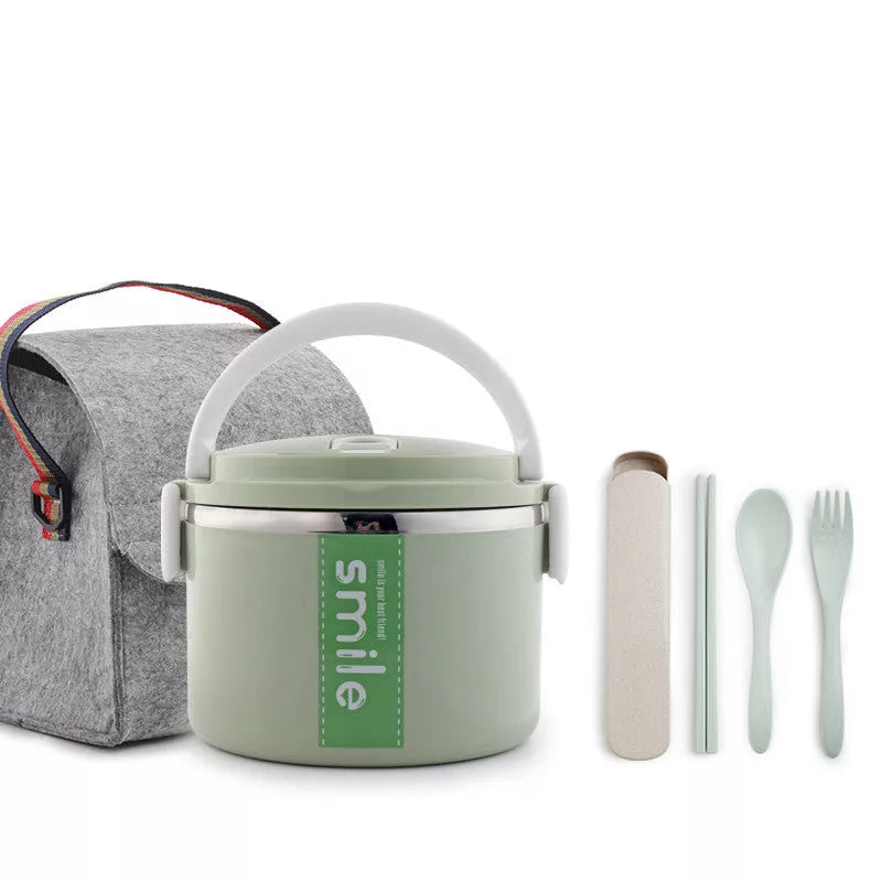Stainless steel lunch box with built-in spoon, leak-proof design, available in green, pink, and blue