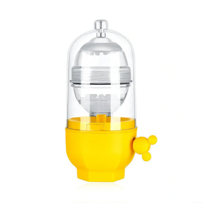 Manual egg mixer with golden egg puller for easy yolk mixing, durable PC cover, and food-grade silicone pads.