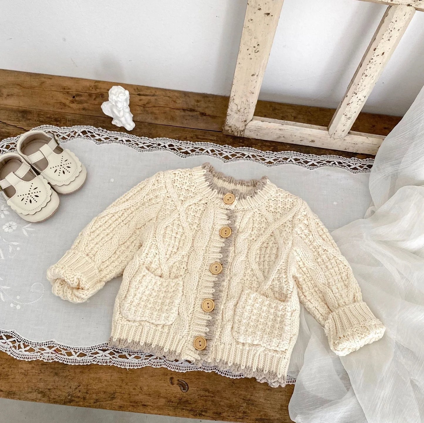 Girls' apricot white cotton knitted coat with round neck, shown in various height sizes from 66cm to 100cm