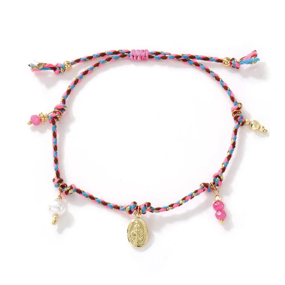 Close-up of a colourful hand-woven braided rope bracelet for women, showing ethnic strap design.