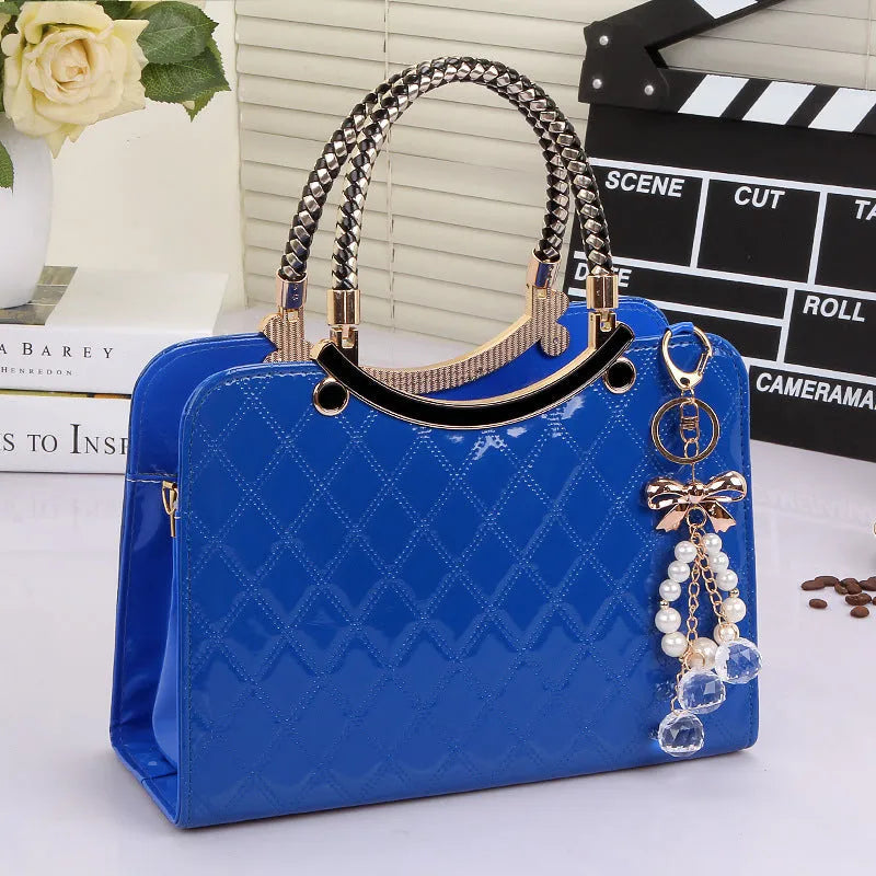 Lingge PU square shoulder bag for women with rhombic quilted design, zip opening, and hard handle.