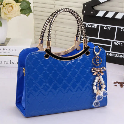 Lingge PU square shoulder bag for women with rhombic quilted design, zip opening, and hard handle.