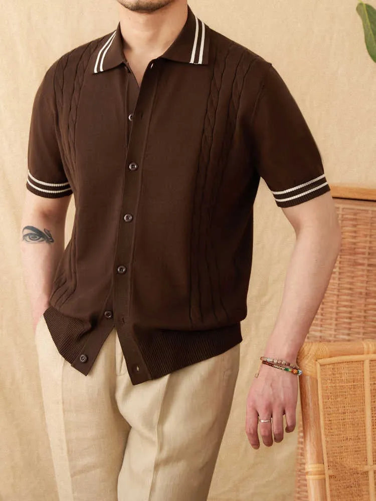 Casual apricot coloured lapel collar polo shirt made from thin cotton blend fabric on a hanger.
