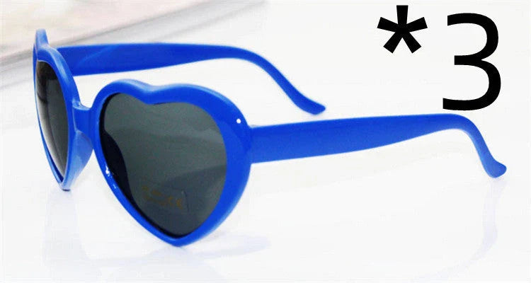 Stylish heart-shaped lighting sunglasses with a plastic frame and resin lenses, creating a mesmerizing effect for romantic occasions