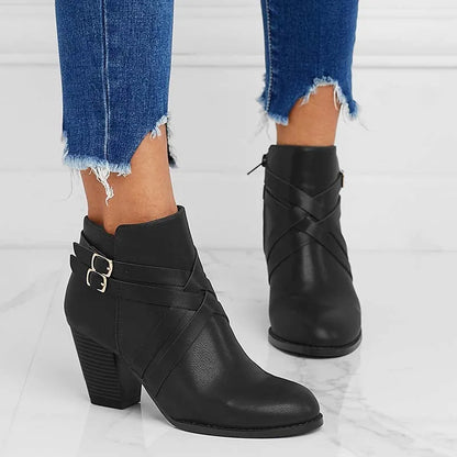 Women's plus size black PU leather short ankle boots with a 7cm heel and side zipper.