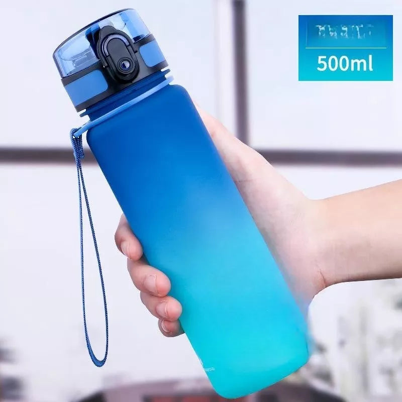 Large capacity Tritan sports water bottle in vibrant colors, perfect for hydration on the go