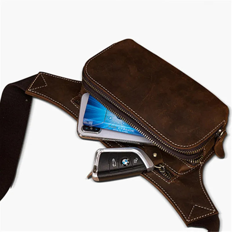 Brown top layer cowhide men's sports waist bag showing 30 cm width, pull closure, and internal phone compartment