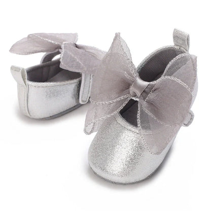 Girls' soft-soled toddler shoes with Velcro fastening in princess style, showing non-slip sole detail