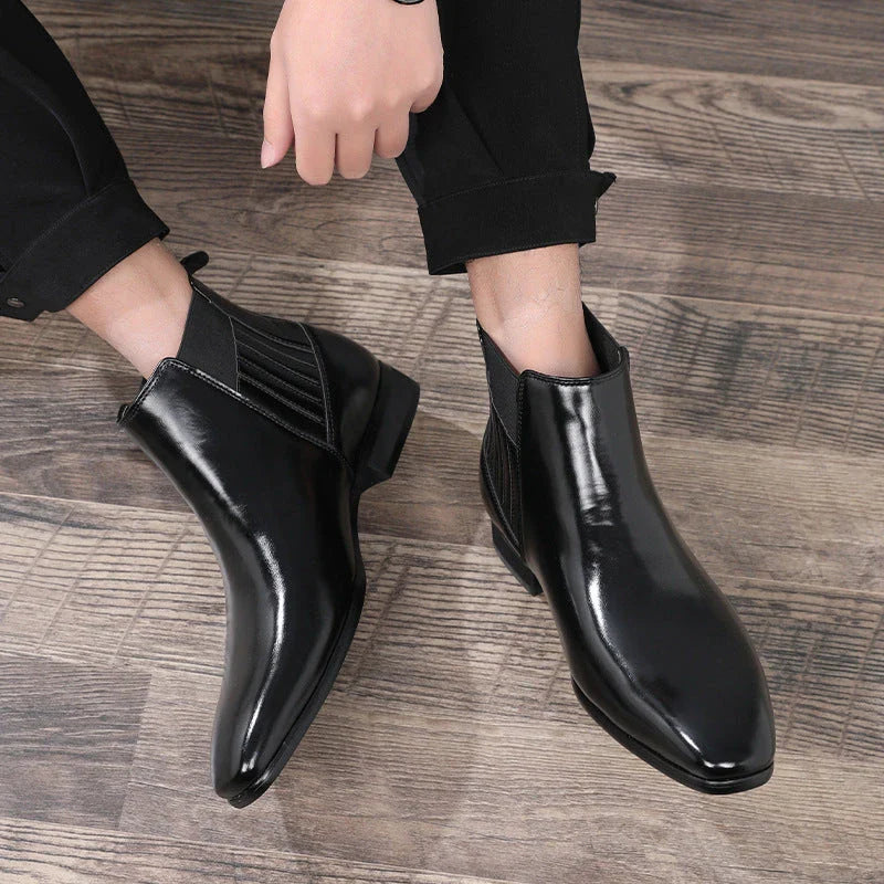 Sleek Chelsea-style boots for men with pointed toe and square heel, available in black and brown colors