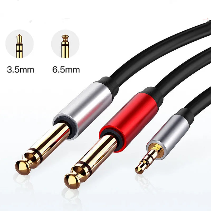 A 3.5mm stereo jack to two 6.5mm mono jack audio cable on a grey background.