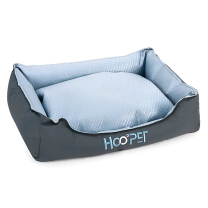 Soft grey dog bed with removable cover showing sizes for small, medium, and large pets