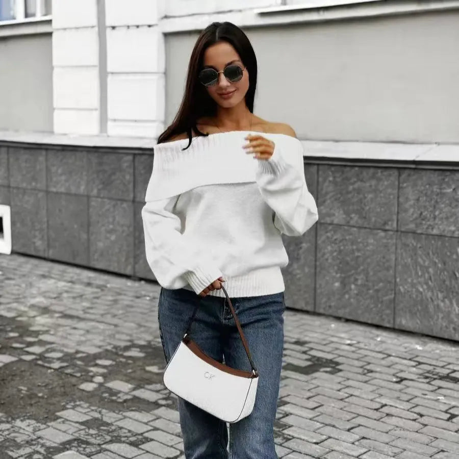 Grey off-shoulder acrylic sweater with 3D pattern texture, showing strapless design and regular sleeves