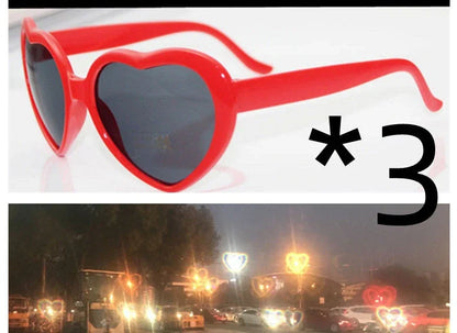 Stylish heart-shaped lighting sunglasses with a plastic frame and resin lenses, creating a mesmerizing effect for romantic occasions