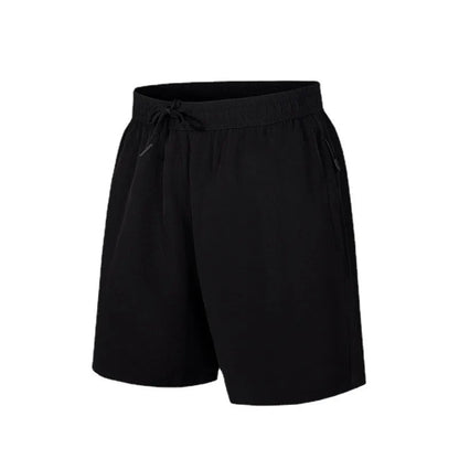 Man wearing black loose-fit ice silk sports shorts with a micro-elastic waistband, suitable for running or casual summer wear.