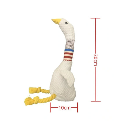 White plush dog toy with reinforced stitching, approximately 20cm long