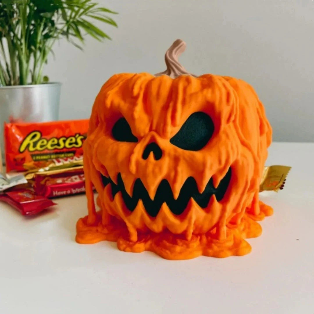 Spooky Halloween pumpkin-shaped candy bowl with lid, made of durable PVC for reusable and easy-to-clean trick-or-treating display