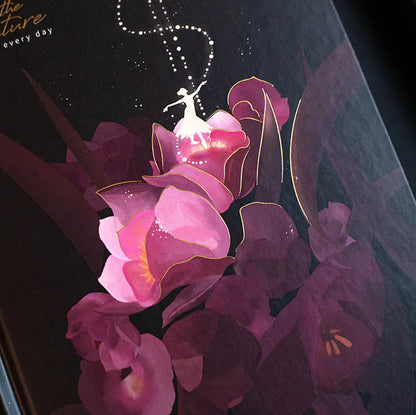 A5 notebook with luminous cover in Deep Blue, open to show 100 gsm paper and colour illustrations