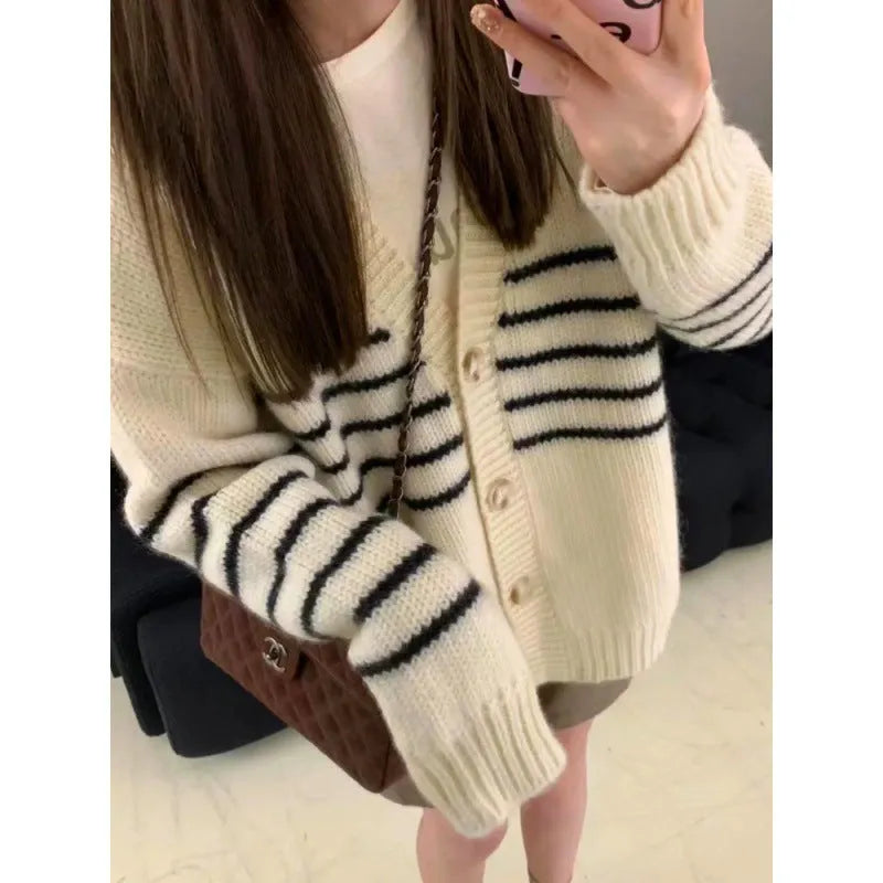 Grey collared cardigan with raised 3D pattern, shown buttoned up with a relaxed, free-size fit.