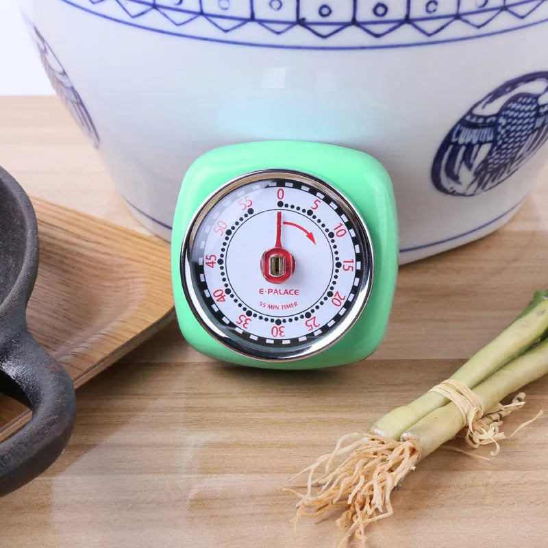 Metal kitchen timer clock with square circle design, shown in green, pink, or mirror light options.