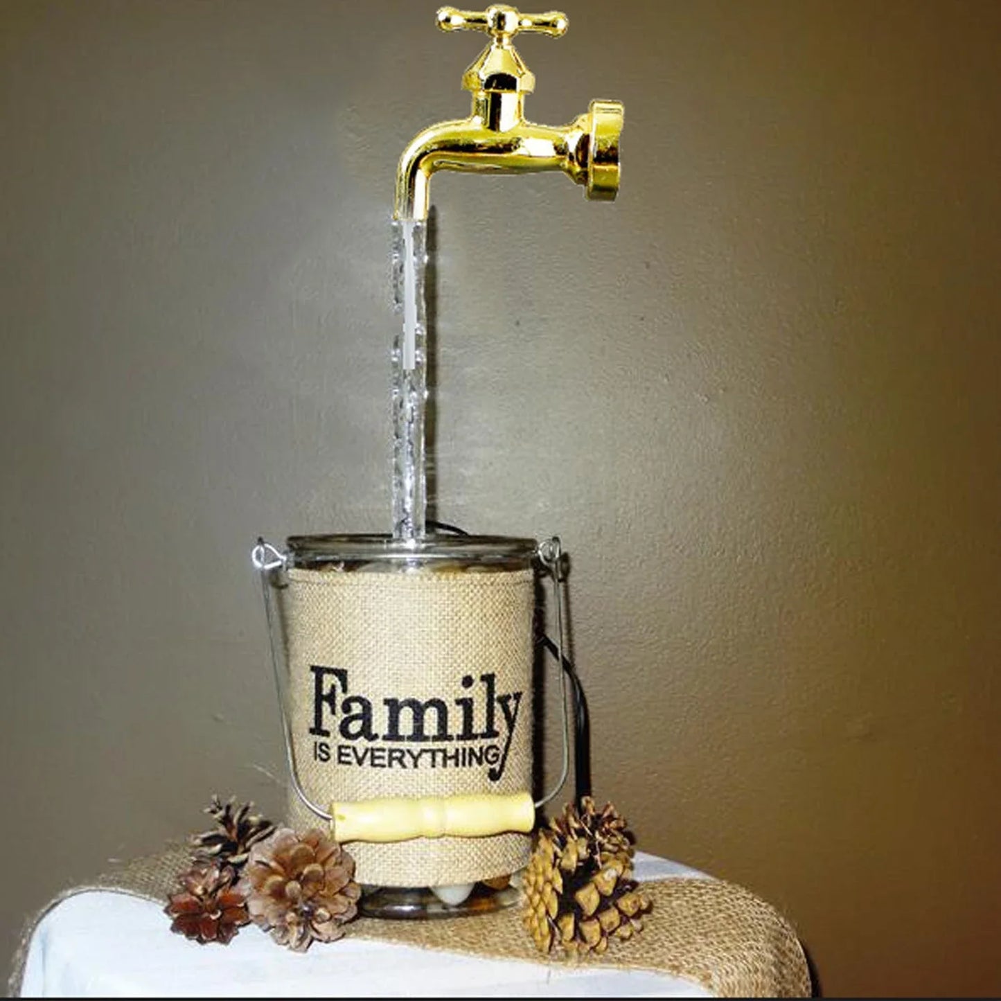 Decorative faucet-style outdoor fountain with LED lights, perfect for enhancing any patio, garden, or yard