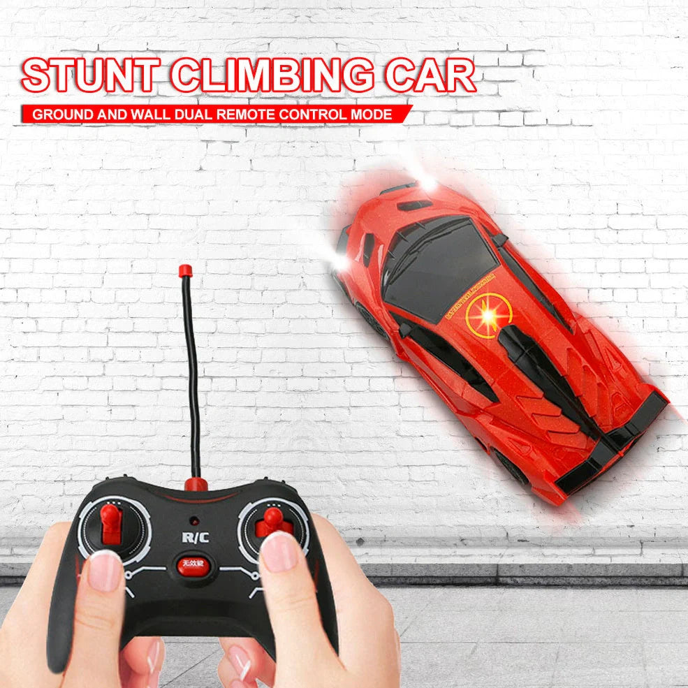 Red remote-controlled car climbing wall with industrial fan system and wireless controller