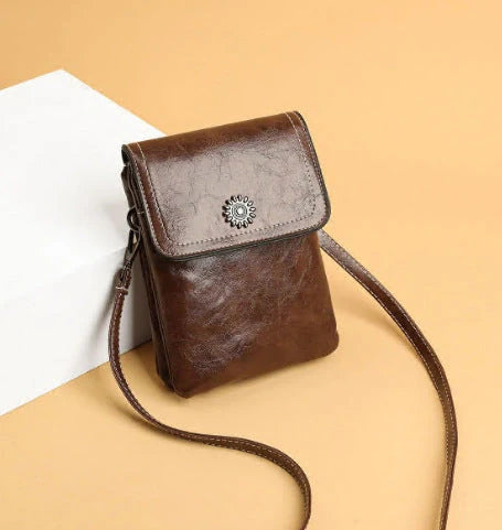 Stylish crossbody bag with mobile phone pocket, available in yellow, black, and brown colors