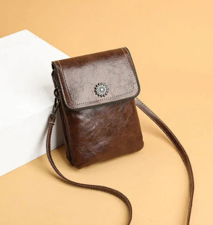 Stylish crossbody bag with mobile phone pocket, available in yellow, black, and brown colors