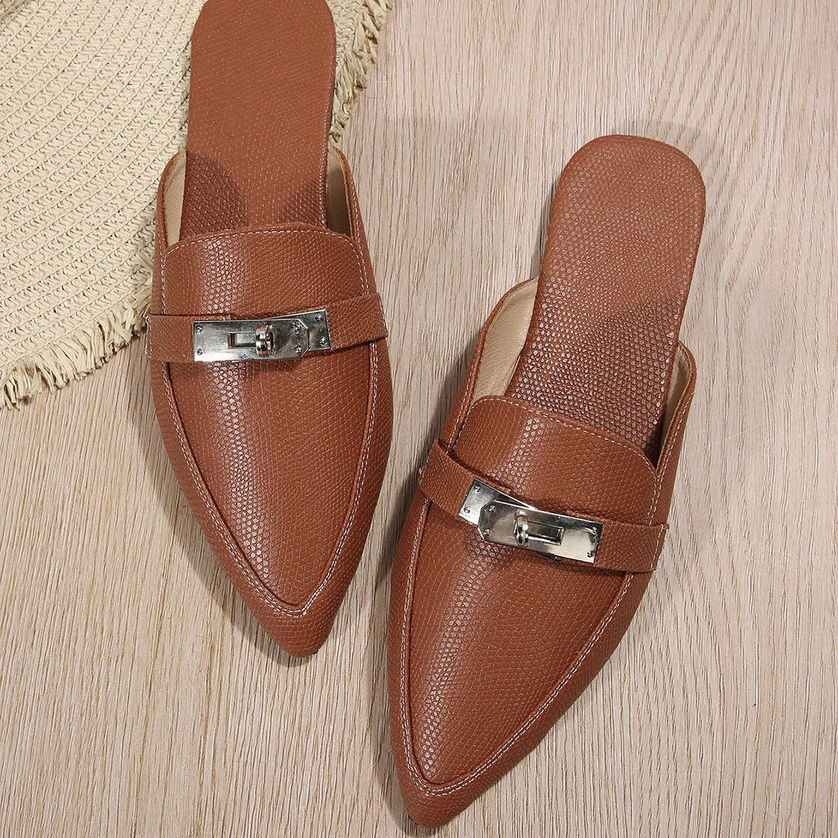 Light brown women's pointed-toe low heel slip-on slippers with a PU leather upper and rubber sole.