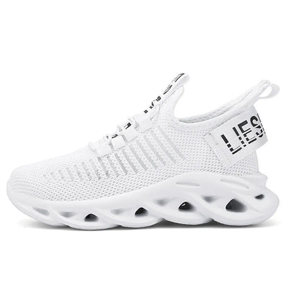 Children's black Velcro fasten coconut sneakers with breathable fabric upper and lightweight EVA sole.