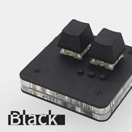 Mini white plastic USB wired keyboard with multimedia keys on a desk.