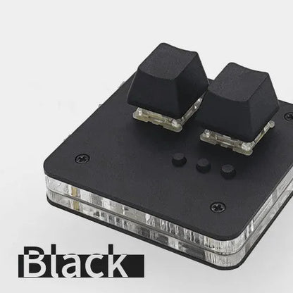 Mini white plastic USB wired keyboard with multimedia keys on a desk.