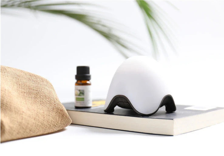 GX-L07 compact humidifier with wood grain finish and LED night light