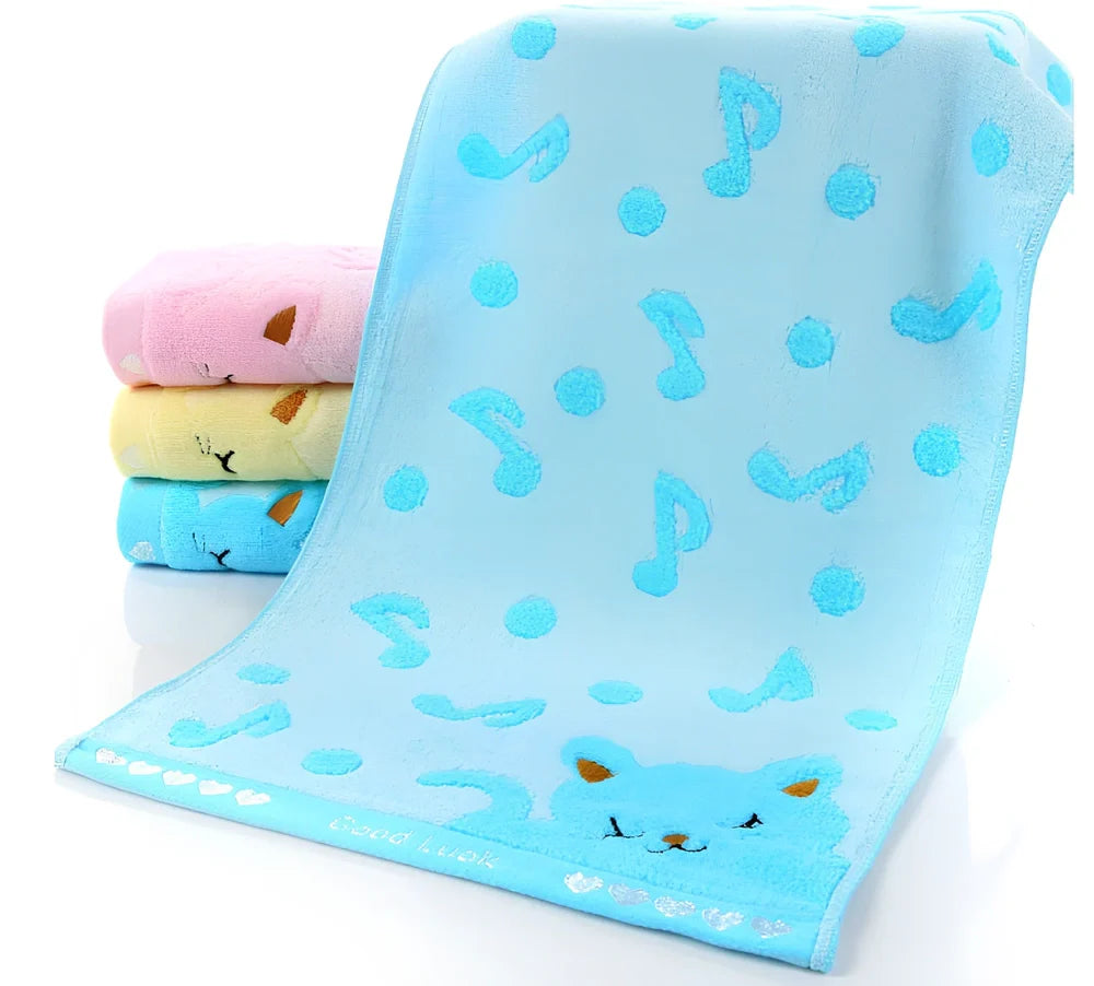 Bamboo fibre bath towel with kitten face pattern measuring 25x50cm in blue, green, pink or yellow