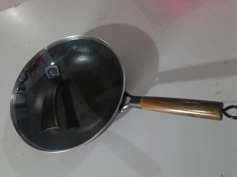 Traditional handmade iron wok pan with wooden handle, 40 cm diameter cooking surface
