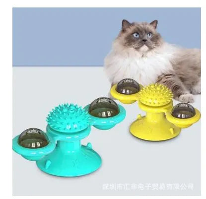 Cat rotating windmill toy with suction base, two transparent bins, blue and yellow-green TPR body.