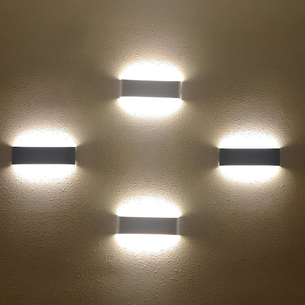 Slim 310mm wall light with aluminium alloy construction and 3000K warm LED illumination