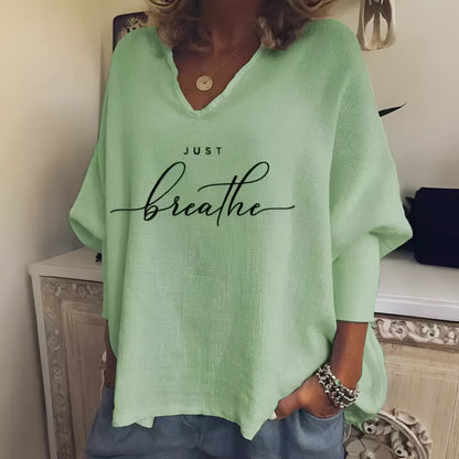 Women's loose-fit V-neck long sleeve top in brushed milk silk fabric for summer casual wear.