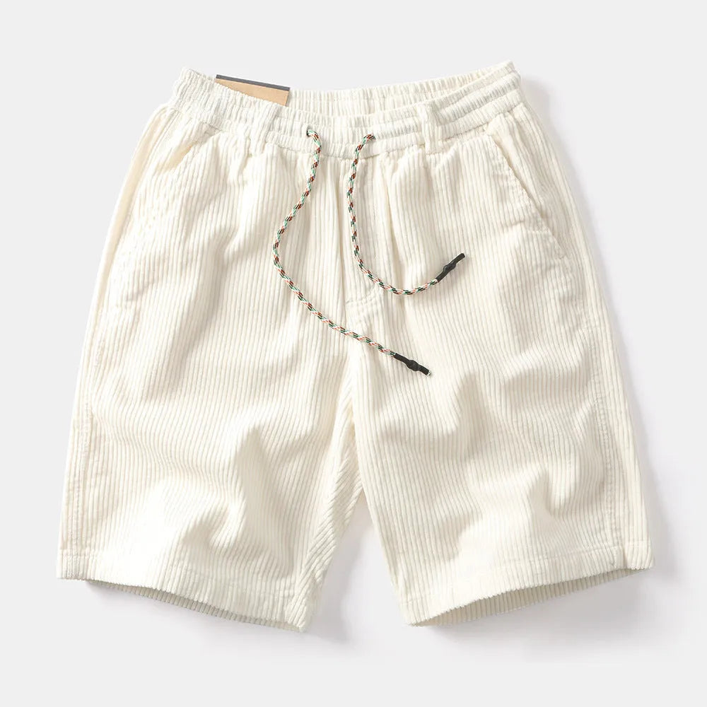 Men's khaki cargo shorts with multiple pockets on a straight-leg fit, shown on a hanger.