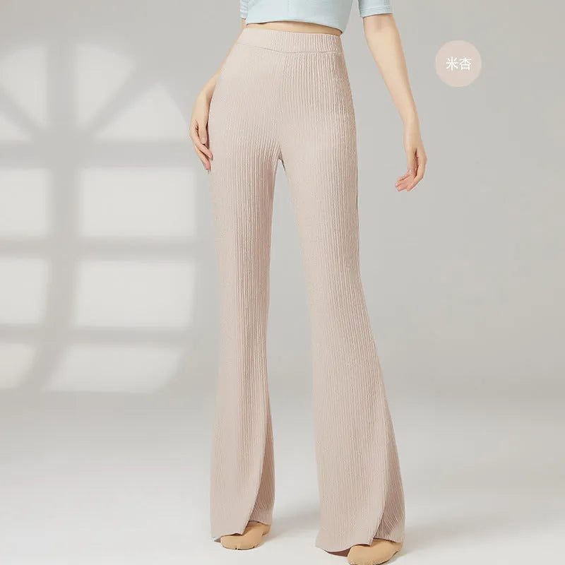 Female classical dance practice training pants in polyester, shown in beige apricot colour.